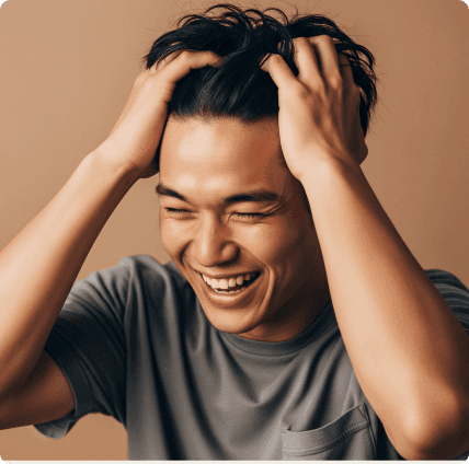 A man enjoying his hair
